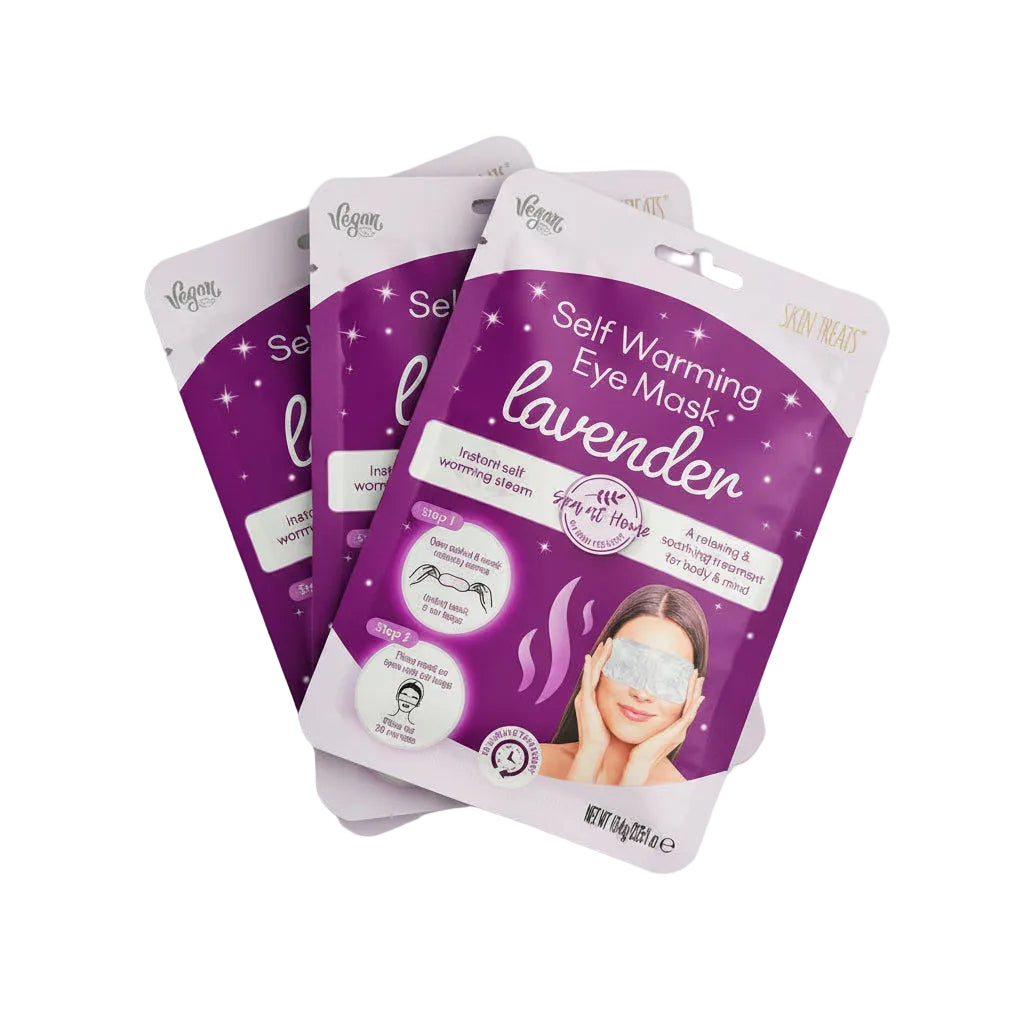 Purple and white eye mask packaging on a dark surface