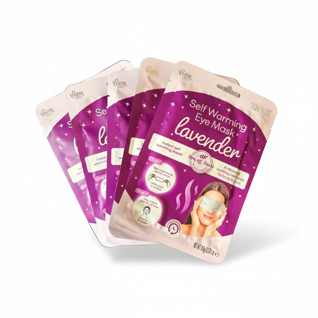 Purple and white eye mask packaging on a dark surface