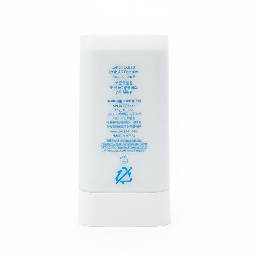 White tube with blue text on a dark background