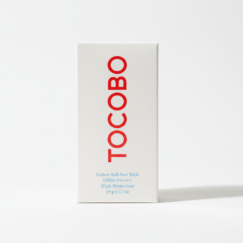 Tocobo sunscreen stick packaging on a dark background